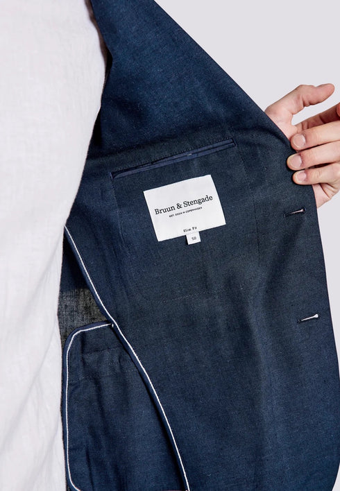 Donkerblauw effen Kostuum